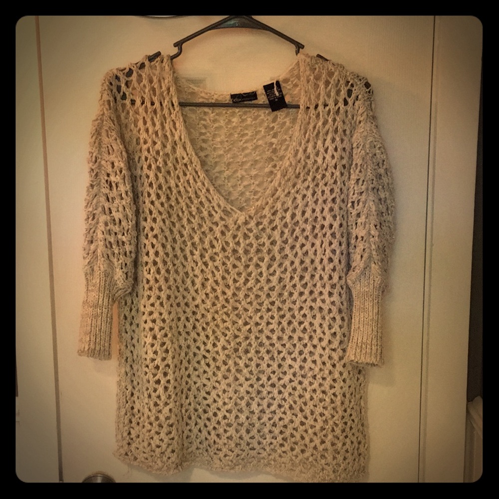 Beautiful woven sweater.